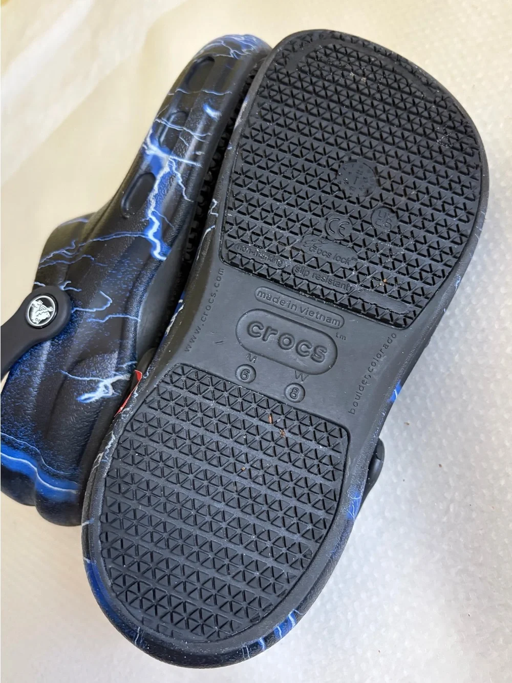CROCS Black Clogs with Blue Lightning Print‎ M6 - W8